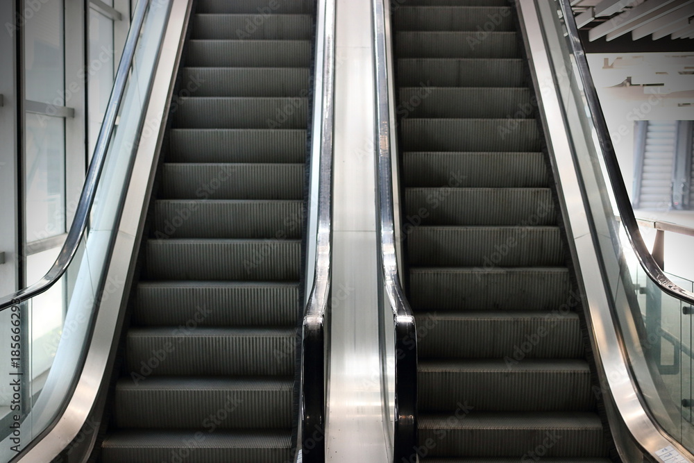 Cropped image of old escalator. Selective focus and shallow depth of field. Cropped image of old escalator. Selective focus and shallow depth of field.
