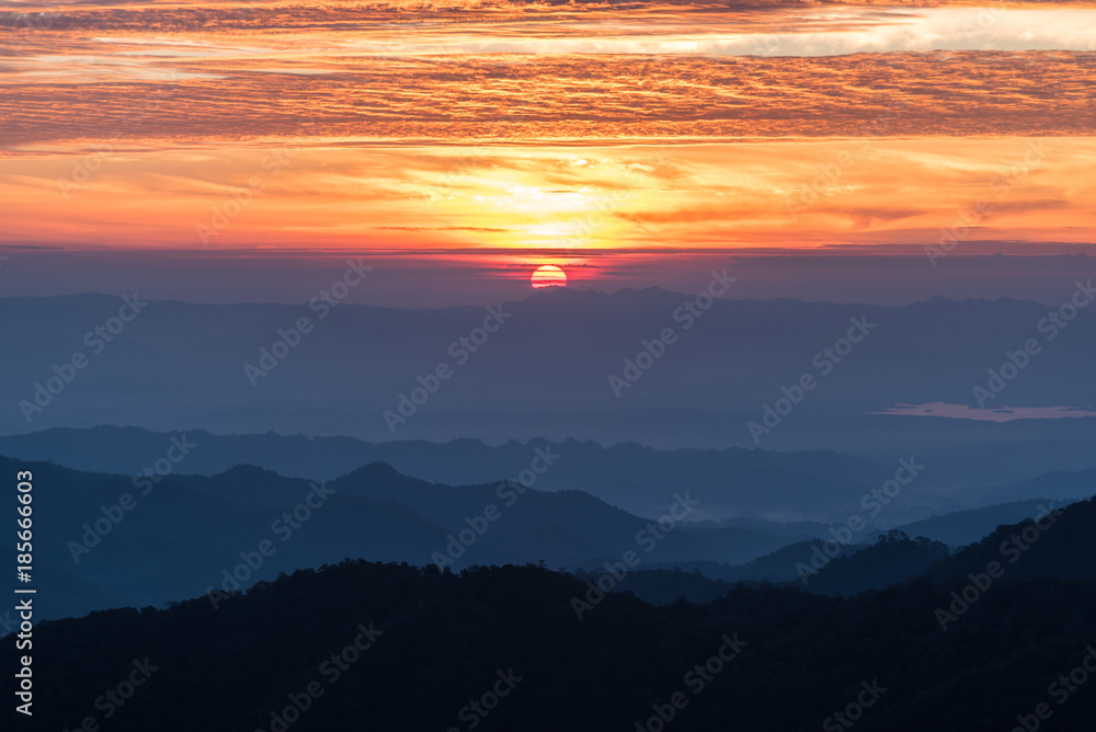 Fototapeta premium Sunset scene with silhouette mountain at Doi Langka Noi, Chiang Mai Province, Thailand