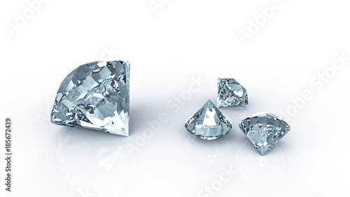 Diamonds on reflecting table and white background