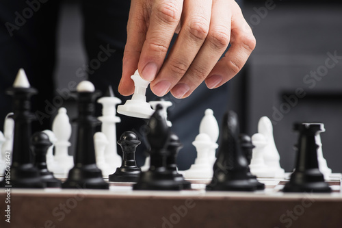 a man plays chess
