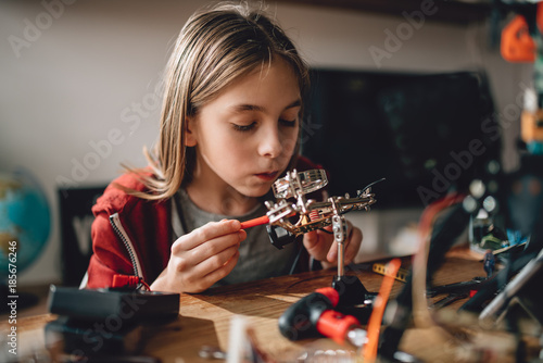 Girl learning robotics photo