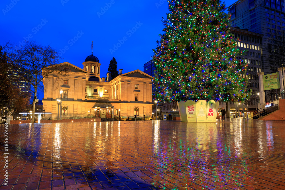 Pioneer Courthouse with christmas tree on a rainy winter night