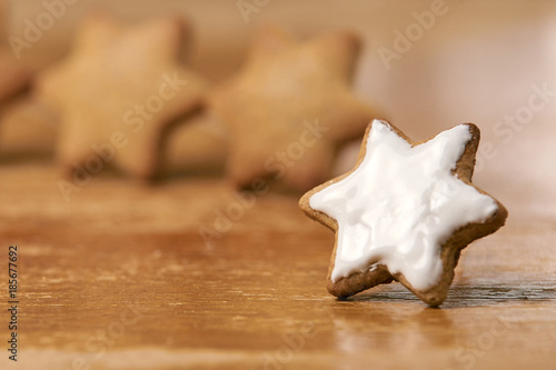 White sweet glaze. Gingerbread Cookie. Blurred Background