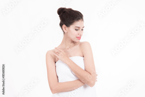 Woman with towel spa bath. Beautiful white woman wrapped in white towel isolated in white. Beauty spa concept.