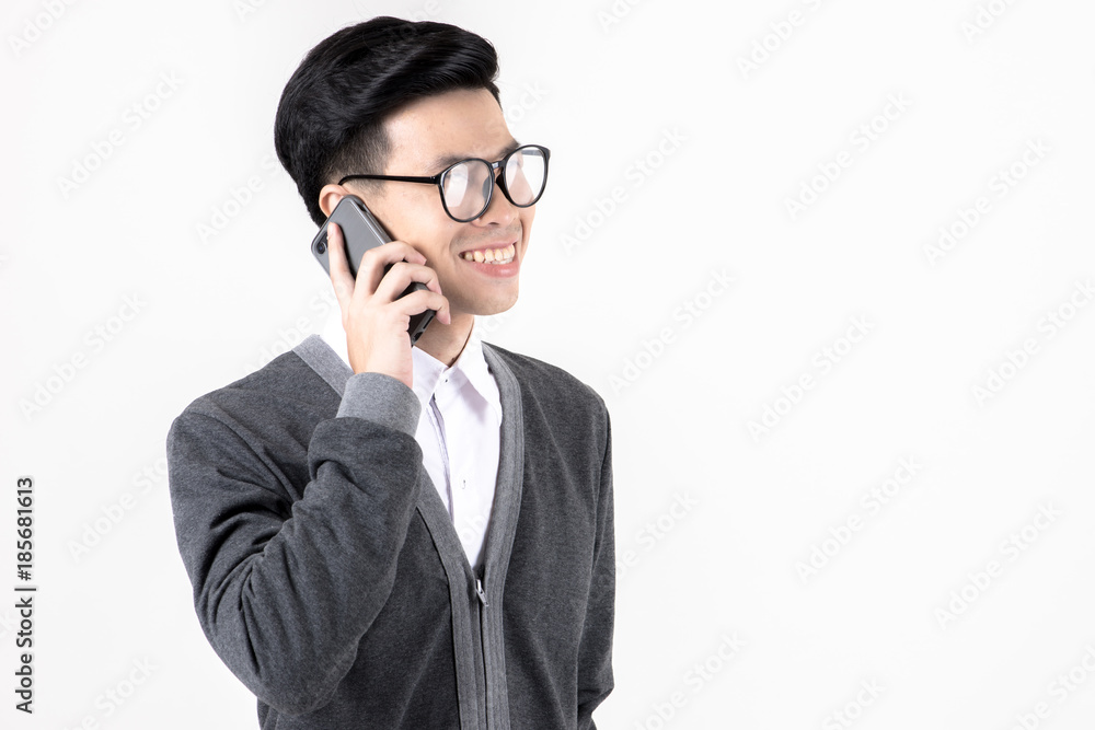Confident young business woman in smart office dress on phone. Confident young business woman in smart office dress on phone.
