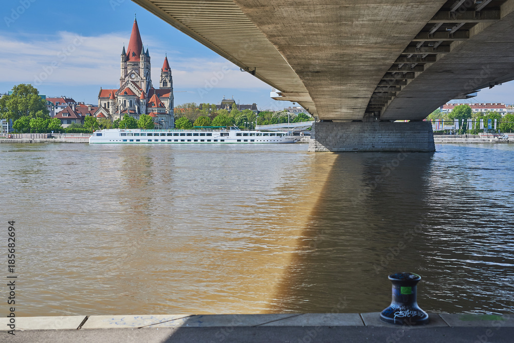 Under the bridge view on the Danube and the palace in Vienna	