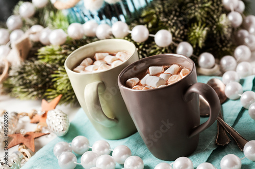 Hot chocolates with marshmallows in Christmas setup