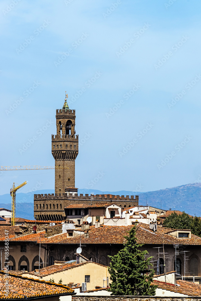 Distant view of the Palazzo Vecchio, ancient town hall in Florence, Italy.