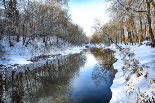 Winter landscape by a river