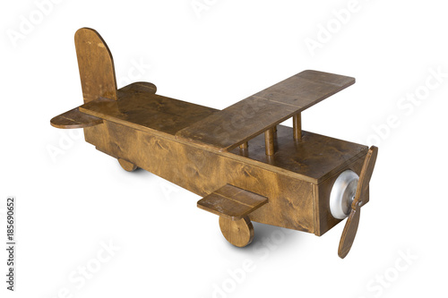 Toy wooden plane on a white background