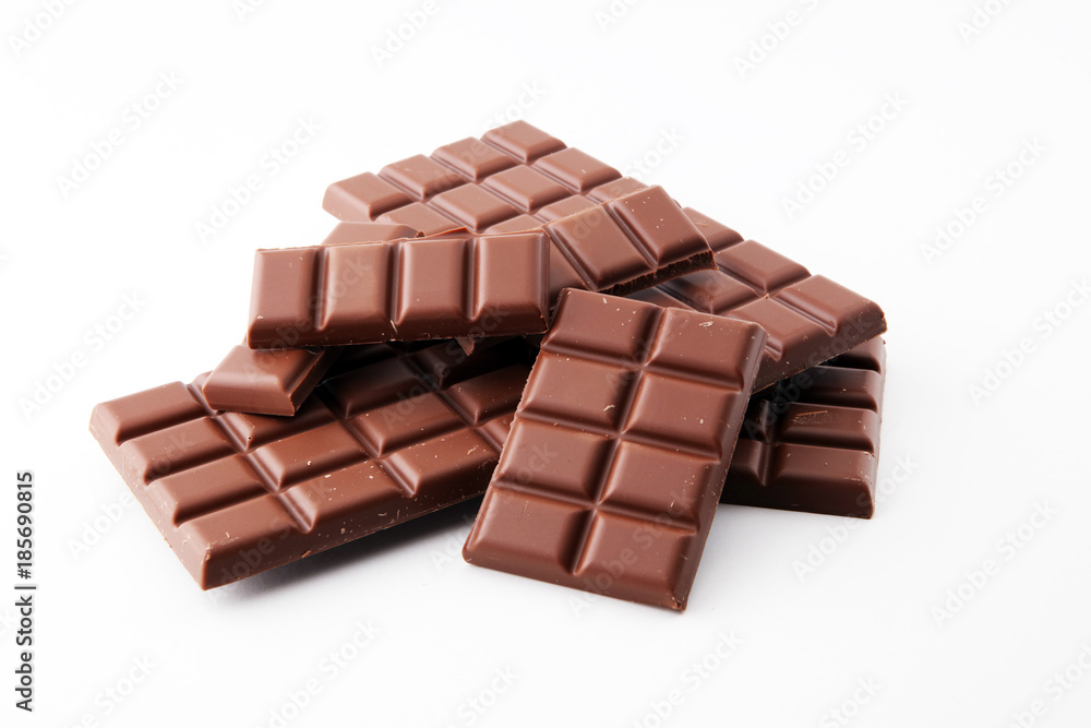 close up of chocolate bars isolated on white background. close up of chocolate bars isolated on white background.