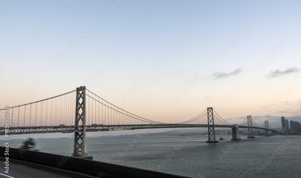 Oakland Bay Bridge, sunset skyline - San Francisco, SF, California, CA, USA