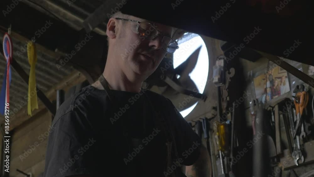 Award winning blacksmith looks into the heat of his forge Award winning blacksmith looks into the heat of his forge