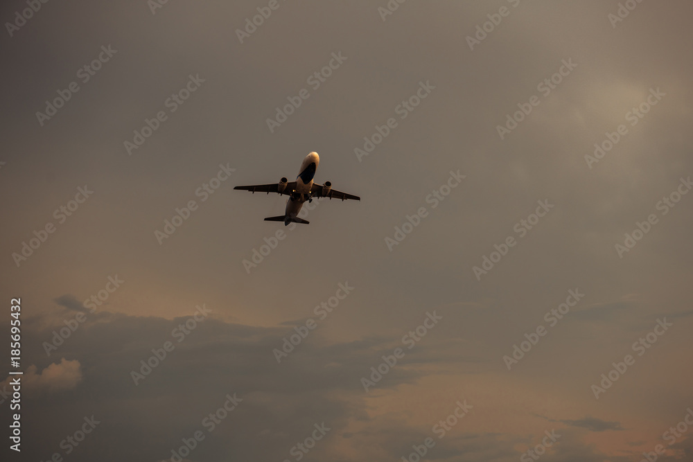 Airplane take off silhouette with sunlight in background. Airplane take off silhouette with sunlight in background.