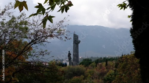 The monument to Lenin on a background of mountains in Artek photo