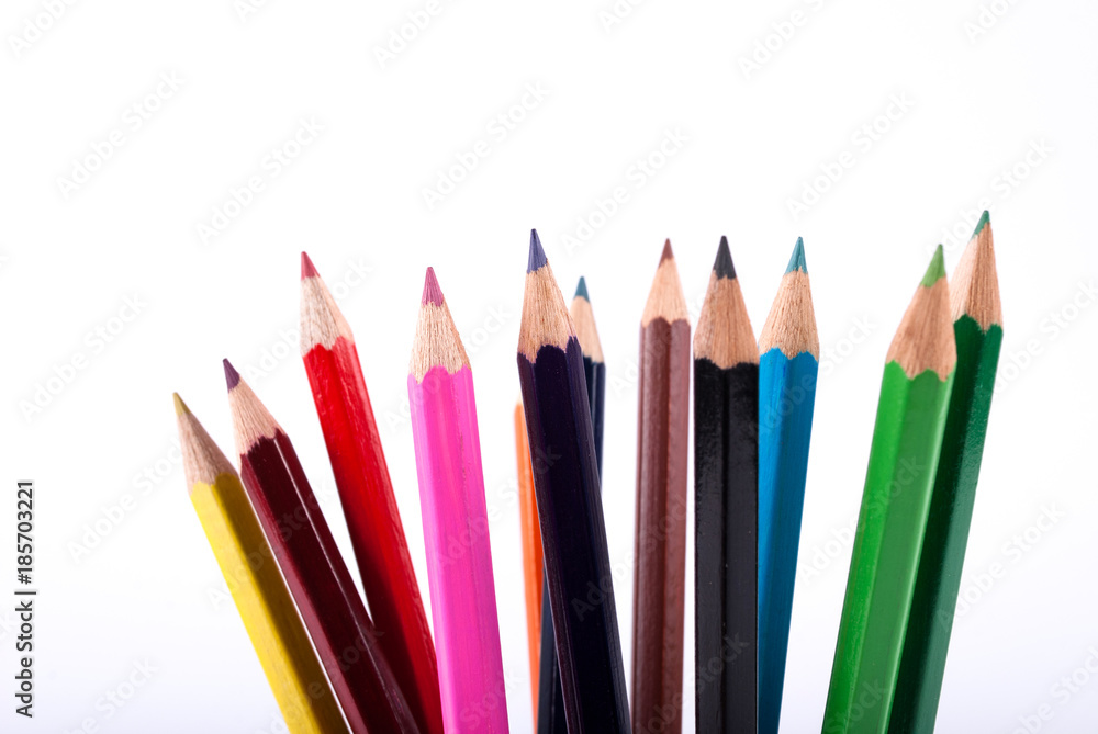 Colorful wooden pencils isolated on white background, close up Colorful wooden pencils isolated on white background, close up