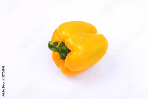 A yellow pepper isolated on a white background photo