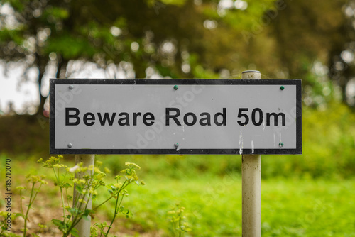 Sign: Beware road 50m, seen near Bawdsey, Suffolk, England, UK