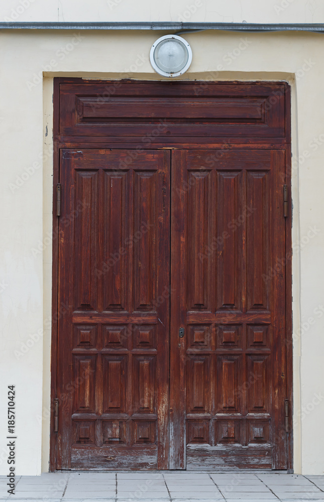 Old wooden door. Rear entrance.