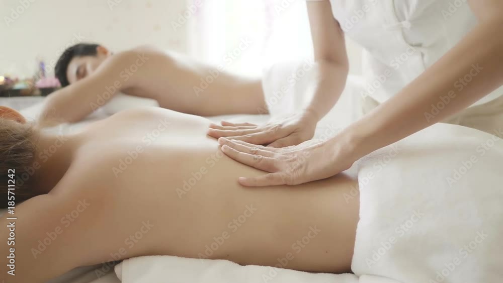 Young couple lying down on massage beds at Asian luxury spa. Relaxing and health
Young couple lying down on massage beds at Asian luxury spa. Relaxing and health