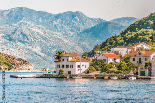 View on the coast from ferry transporting cars and people in Lepetane, Kotor, Montenegro.