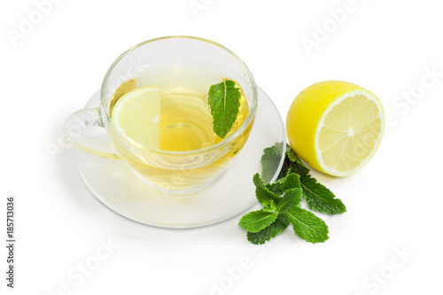 Tea with mint and lemon on a white background