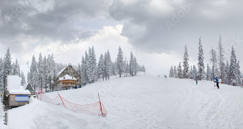 Mountain slope with ski pistes on ski resort in Carpathians © An-T