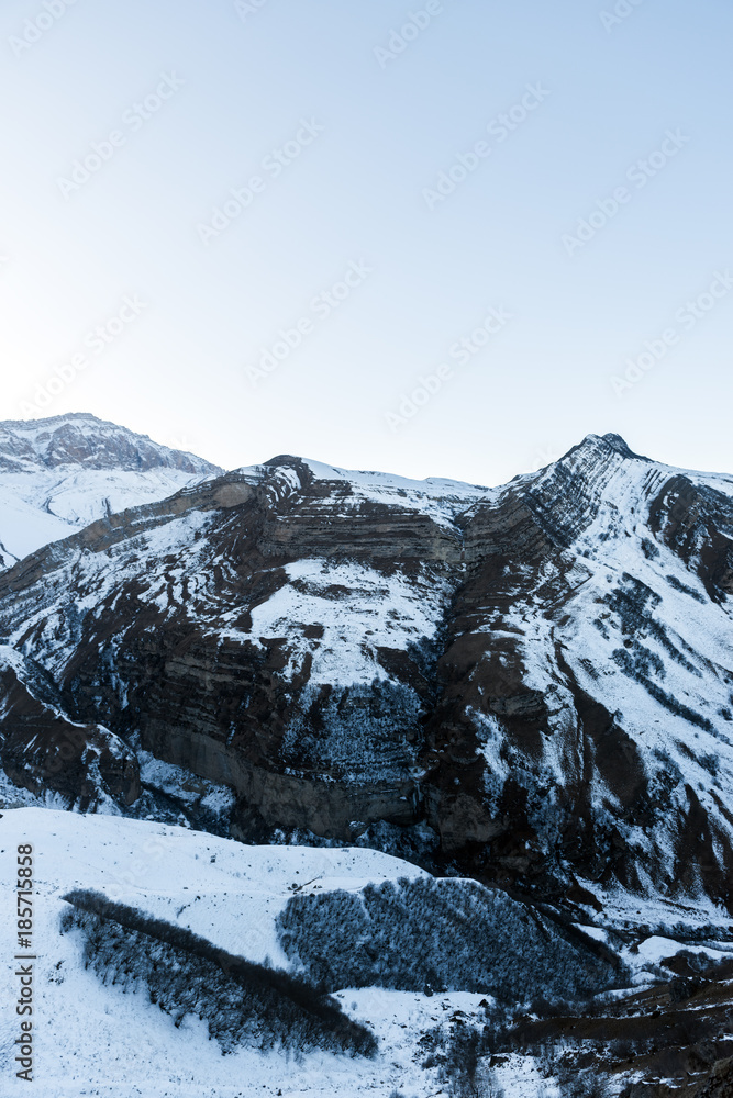 Snow covered mountains peaks, winter mountains