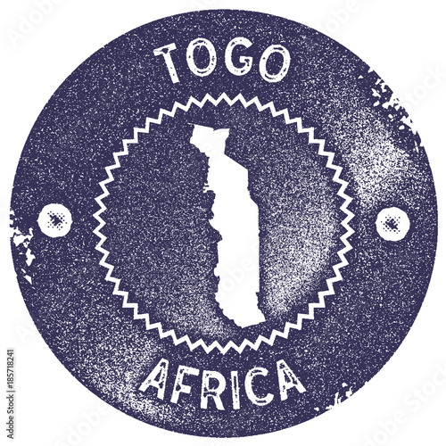 Togo map vintage stamp. Retro style handmade label, badge or element for travel souvenirs. Deep purple rubber stamp with country map silhouette. Vector illustration.