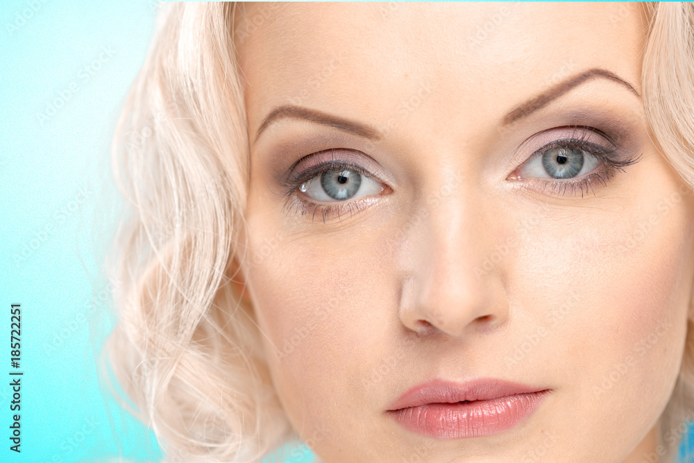 Beautiful woman close up portrait on blurred background Beautiful woman close up portrait on blurred background