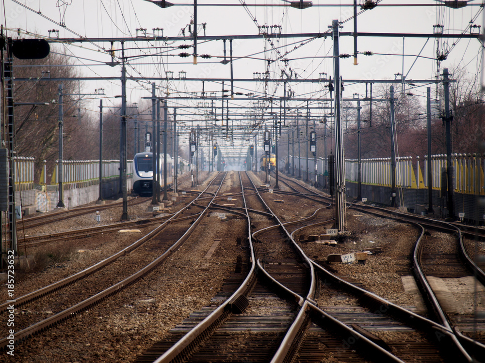 Naklejka premium a lot of tracks with trains around the station of Gouda, the Netherlands