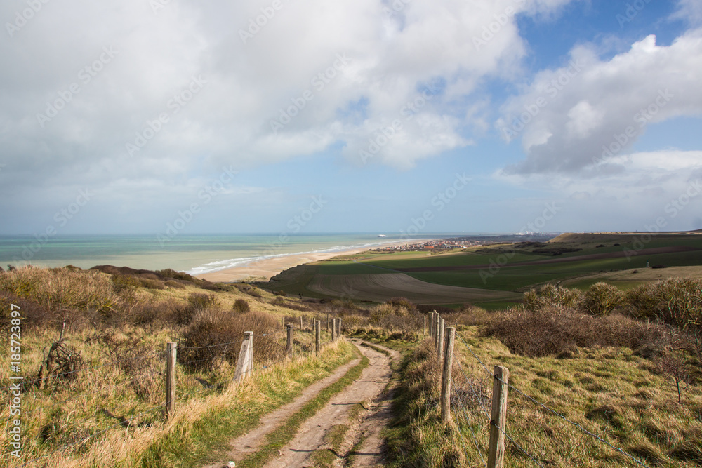 Small road on the way to the beach in France