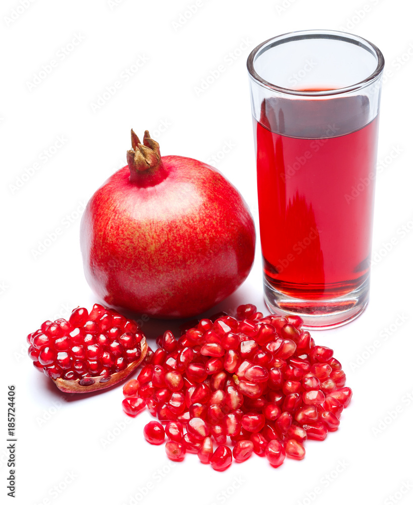Pomegranate juice and fruit on white background close-up Pomegranate juice and fruit on white background close-up