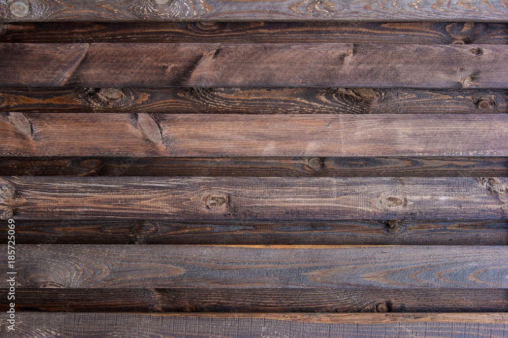 Obraz premium Natural wood background. Brown boards. Wooden fence.