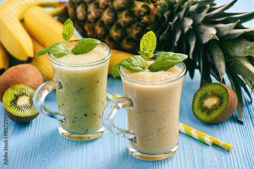 Healthy smoothie with pineapple, kiwi fruit and bananas. photo