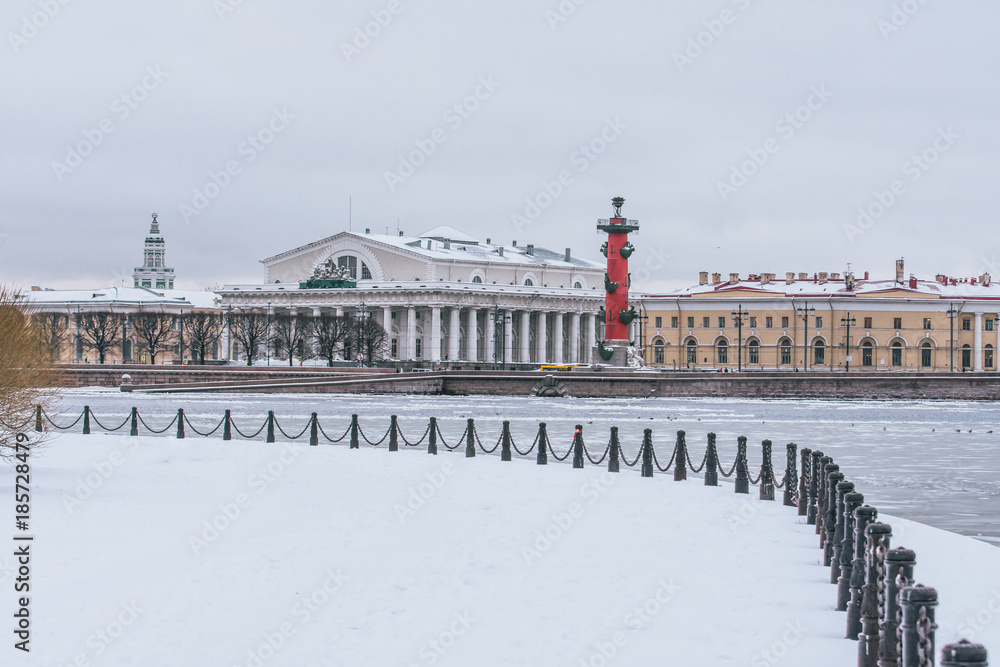 Arrows of Vasilievsky Island on a winter frosty day. Saint-Petersburg, Russia.