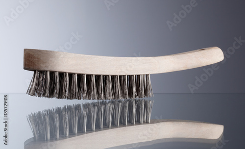 Wire brush with wooden handle