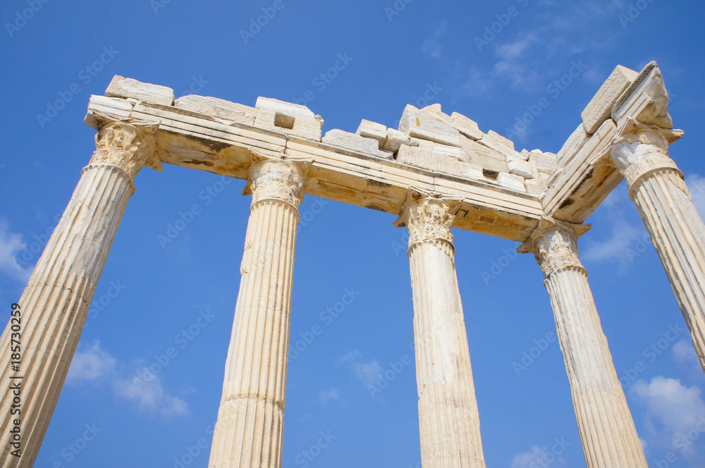 Ruins of old greek Apollo temple In Side, Turkey with blue sky background