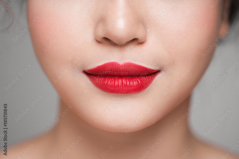 Fototapeta premium Red Sexy Lips closeup. Make up concept. Beautiful Perfect Lips.