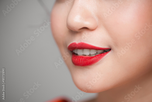 Close-up of beautiful perfect red lips. Selective focus.