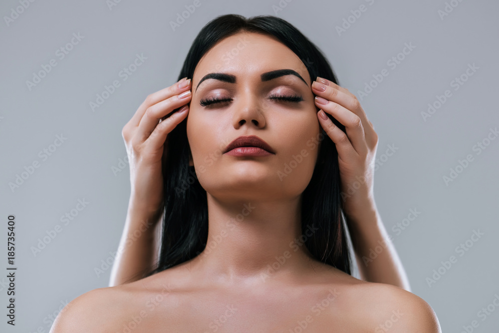 Fototapeta premium Beautiful woman on grey background