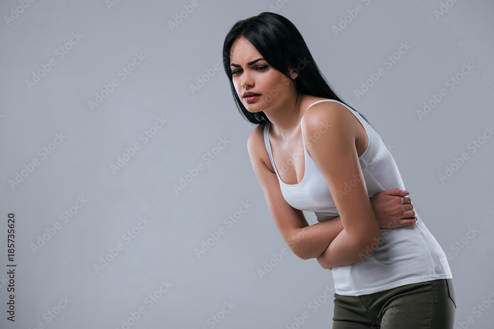 Naklejka premium Beautiful woman on grey background