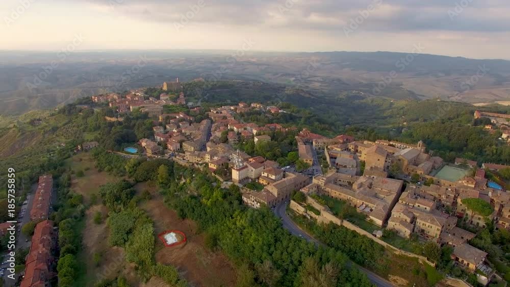 The hilltop town of Montepulciano at sunset in an aerial shot The hilltop town of Montepulciano at sunset in an aerial shot