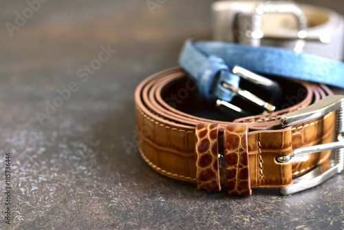 Stylish leather belt with metal buckle.