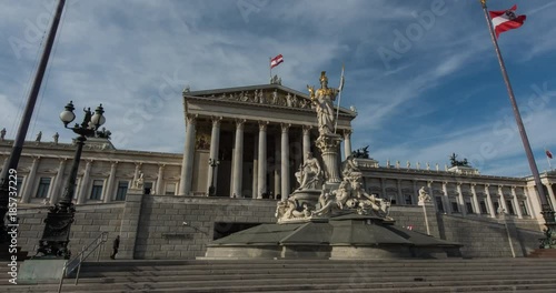 VIENNA, AUSTRIA – DECEMBER 2015 : Moving timelapse / hyperlapse of Vienna Parliament with Day to Night transition
