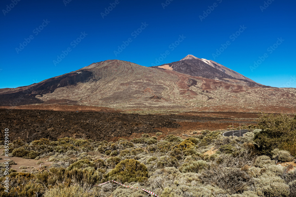 Teide National Park, Tenerife, Canary Islands - A picturesque view of the colourful Teide volcano, or in spanish 'Pico del Teide'. The tallest peak in Spain with an elevation of 3718 m.