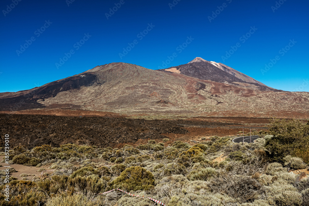 Teide National Park, Tenerife, Canary Islands - A picturesque view of the colourful Teide volcano, or in spanish 'Pico del Teide'. The tallest peak in Spain with an elevation of 3718 m. Teide National Park, Tenerife, Canary Islands - A picturesque view of the colourful Teide volcano, or in spanish 'Pico del Teide'. The tallest peak in Spain with an elevation of 3718 m.