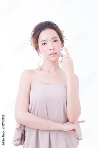Beautiful Asian Woman Portrait. Beautiful Woman looking to camera. Korean Woman Touching her Face. People with Youth and Skin Care Concept. isolated on white background.