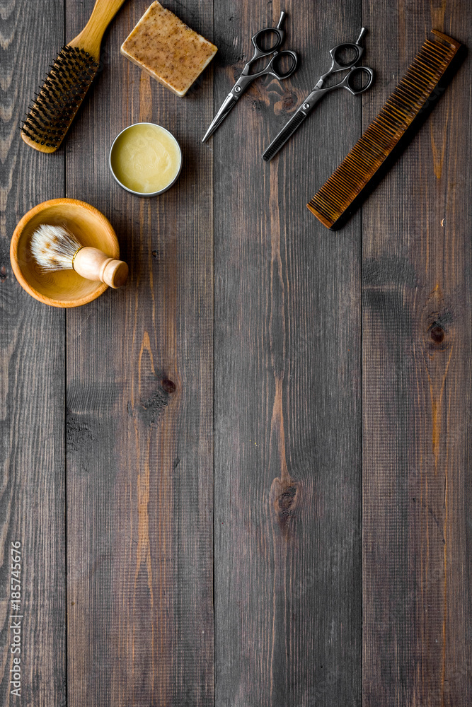 Barbershop tools on dark wooden background top view copyspace Barbershop tools on dark wooden background top view copyspace