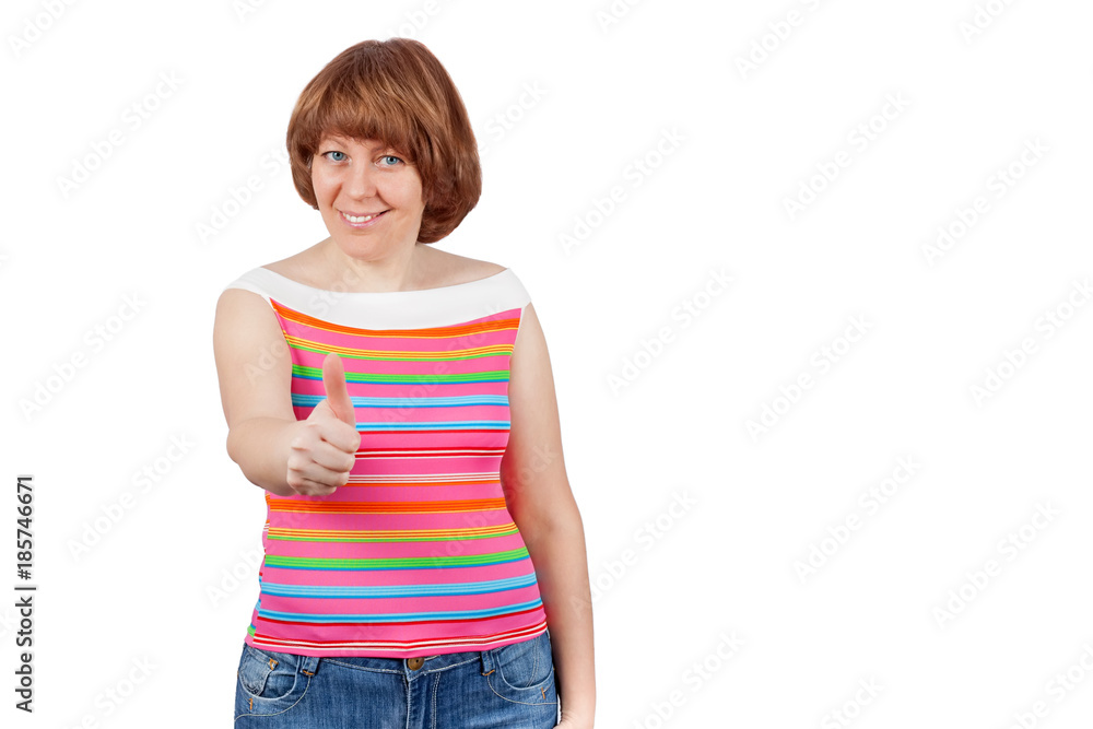 Fototapeta premium Young cute girl smiling and showing thumbs up!